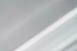 Shadow Striped diagonal sunlight reflection from window on white wall Cement rough texture background, Backdrop Display,Grey Studio background with sunshine diagonal effect overlay on concrete floor photo