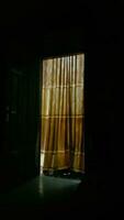 the dark room reflected light from a curtain. photo