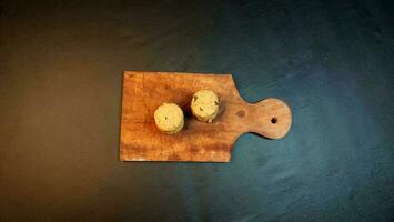 Chocolate chip cookies on kitchen wood. photo