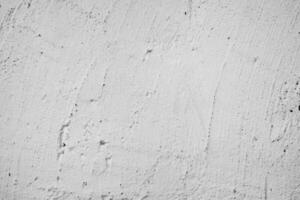 Old light white Concrete wall In black and white color, cement wall, broken wall, background texture photo