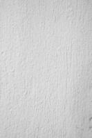 Old light white Concrete wall In black and white color, cement wall, broken wall, background texture,vertical photo