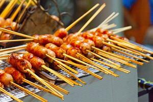 Grilled pork meatball skewers photo