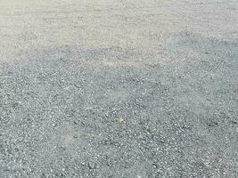Abstract background small round stones Beach rocks Texture material nature, Rock the specifics, grey black color photo