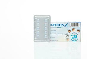 CHONBURI, THAILAND-MAY 3, 2023 Aerius with packaging on white. Desloratadine tablets pill. Product of Organon. Antihistamine medicine for relieve allergic rhinitis and urticaria. Prescription drugs. photo
