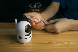 IP wifi wireless security camera supports Internet installation technology, security systems, smart home applications. photo