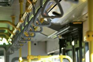 jakarta, indonesia-18 june 2023 transjakarta bus handles with the theme of transjakarta bus interiors photo