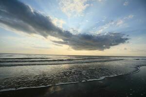 beautiful sunset on the beach photo