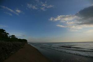 beautiful sunset on the beach photo