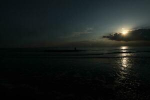 beautiful sunset on the beach photo