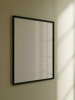 simple frame mockup poster hanging on the beige wall. wall background with window light and shadow photo