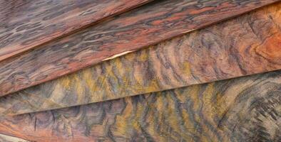 The texture of rosewood planks stacked together photo