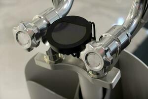 Close up shot of a speedometer dashboard in a EV motorcycle photo
