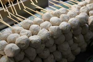 Meatballs on grill at markets in Thailand.  Grilled meatball and pork ball, Meat ball photo