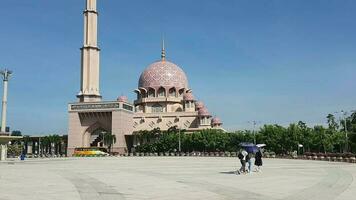 Putra Jaya, Malaysia. May 21, 2023. Putra Mosque or in Malay is Masjid Putre is a mosque that was built in 1997 using rose red granite and consists of three functional areas prayer room, mosque yard video