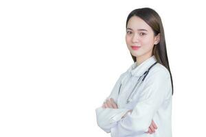 Asian professional woman doctor  Standing with arms crossed. Wearing a white robe and stethoscope isolated on white background. photo