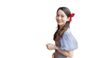 Asian beautiful woman in long hair wears a grey Chinese dress or qipao with Chinese new year theme while isolated on white background.. photo