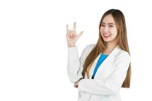 Asian professional young businesswoman in white suit looking at the camera acts exciting and symbol of love to present something isolated on white background. photo