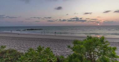 Day to night time lapse movie from sunset at Natai beach in Thailand video