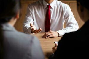 Image of employer or recruiter holding reading a resume during about colloquy his profile of candidate. photo