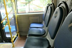 Jakarta, Indonesia-18 June 2023 Transjakarta bus seats with the theme of Transjakarta bus interiors photo