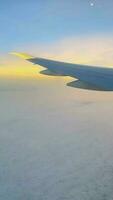 View of the sky and clouds from an airplane window.. video