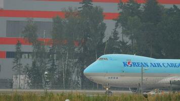 MOSCOW, RUSSIAN FEDERATION JULY 28, 2021 - Boeing 747 of Korean Air Cargo taxiing at Sheremetyevo Airport, Moscow. Jumbo jet on the taxiway video