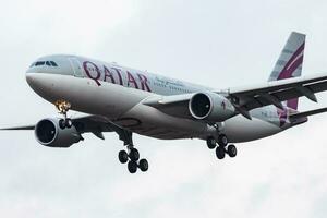 Qatar Airways Airbus A330-200 A7-ACF passenger plane landing at Frankfurt Airport photo