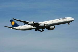 Lufthansa Airbus A340-600 D-AIHF passenger plane landing at Frankfurt Airport photo
