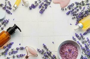 Lavender spa. Lavender salt, natural essential oil and fresh lavender photo