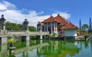 A historical building on the lake with bridge photo