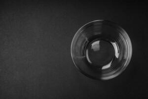 Transparent glass bowl as an element of kitchen utensils for cooking at home photo