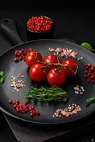 Ingredients for cooking cherry tomatoes, salt, spices and herbs photo