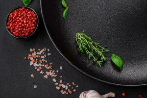 Ingredients for cooking cherry tomatoes, salt, spices and herbs photo