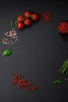 Ingredients for cooking cherry tomatoes, salt, spices and herbs photo