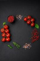 Ingredients for cooking cherry tomatoes, salt, spices and herbs photo