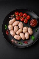 Fresh raw sausages from pork or chicken with salt, spices and herbs photo