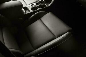 New car seat, with details in black leather, modern and luxurious photo