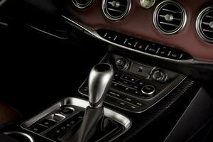 Put a gear stick into p position parking on automatic transmission in a modern car photo