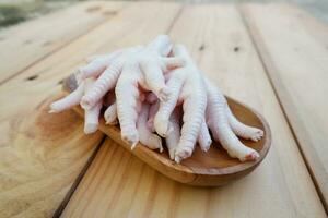 selectively focus on pieces of chicken feet or claws which are ready to be cooked in Indonesian called ceker. soft focus photo