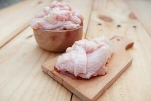 selective focus on piles of chicken skin that are raw and ready to be used as chicken skin oil. soft focus photo