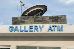 atm gallery writing, a special building for ATM machines to withdraw money from various types of banks photo