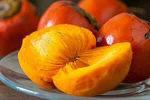 Exotic tropical fruit of Bactris gasipaes palm tree called chontaduro photo