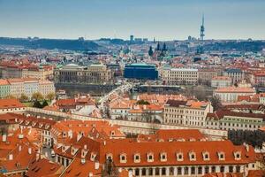 The beautiful Prague city old town seen form the Prague Castle viewpoint in an early spring day photo