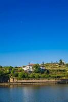 Vila Nova de Gaia on the banks of Douro River seen from Porto city photo