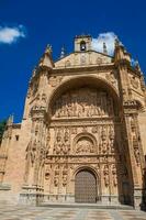 Exterior view of the historical Convent of San Esteban located in the Plaza del Concilio de Trento in the city of Salamanca built between 1524 and 1610 photo