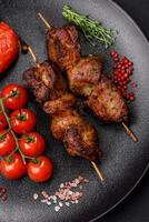 Delicious grilled chicken, turkey or pork skewers with salt, spices and herbs photo