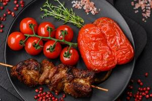 Delicious grilled chicken, turkey or pork skewers with salt, spices and herbs photo