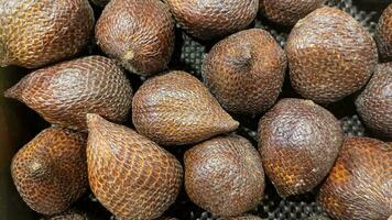 Pile of snakefruit photo