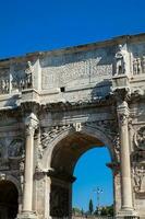 The Arch of Constantine a triumphal arch in Rome, situated between the Colosseum and the Palatine Hill built on the year 315 AD photo