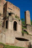 Ruins of an antique monumental fountain called Trofei di Mario built in 226 AD and  located at Piazza Vittorio Emanuele II in Rome photo